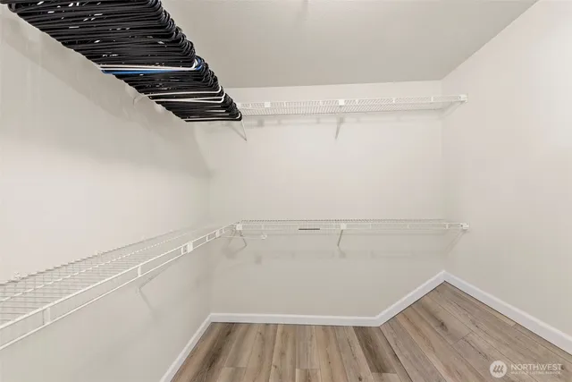 a view of a room with racks on the wall