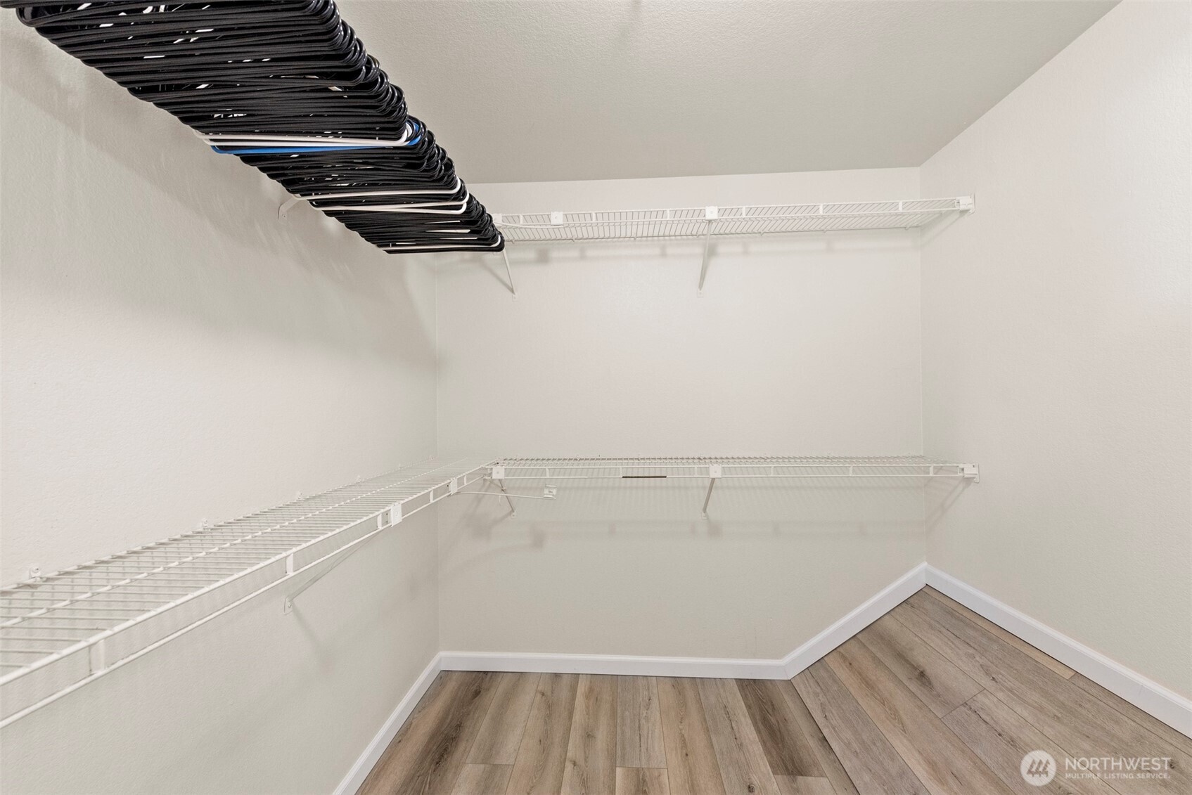 5703 134th Place Southeast, Unit A Snohomish, WA 98296 - Photo 15 of 20 a view of a room with racks on the wall