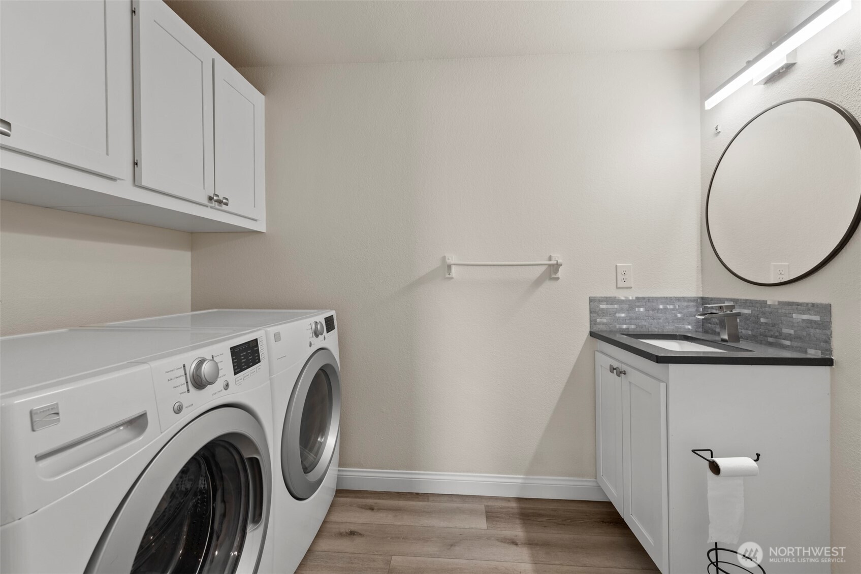 5703 134th Place Southeast, Unit A Snohomish, WA 98296 - Photo 8 of 20 a view of storage and utility room with washer and dryer