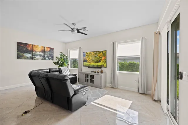 a bedroom with furniture and a chandelier