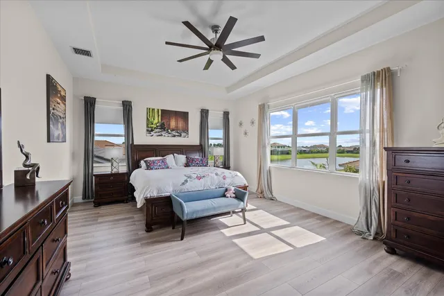 a room with gym equipment and a flat screen tv