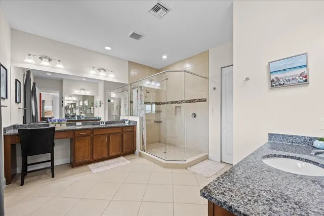 a bedroom with bed and a window