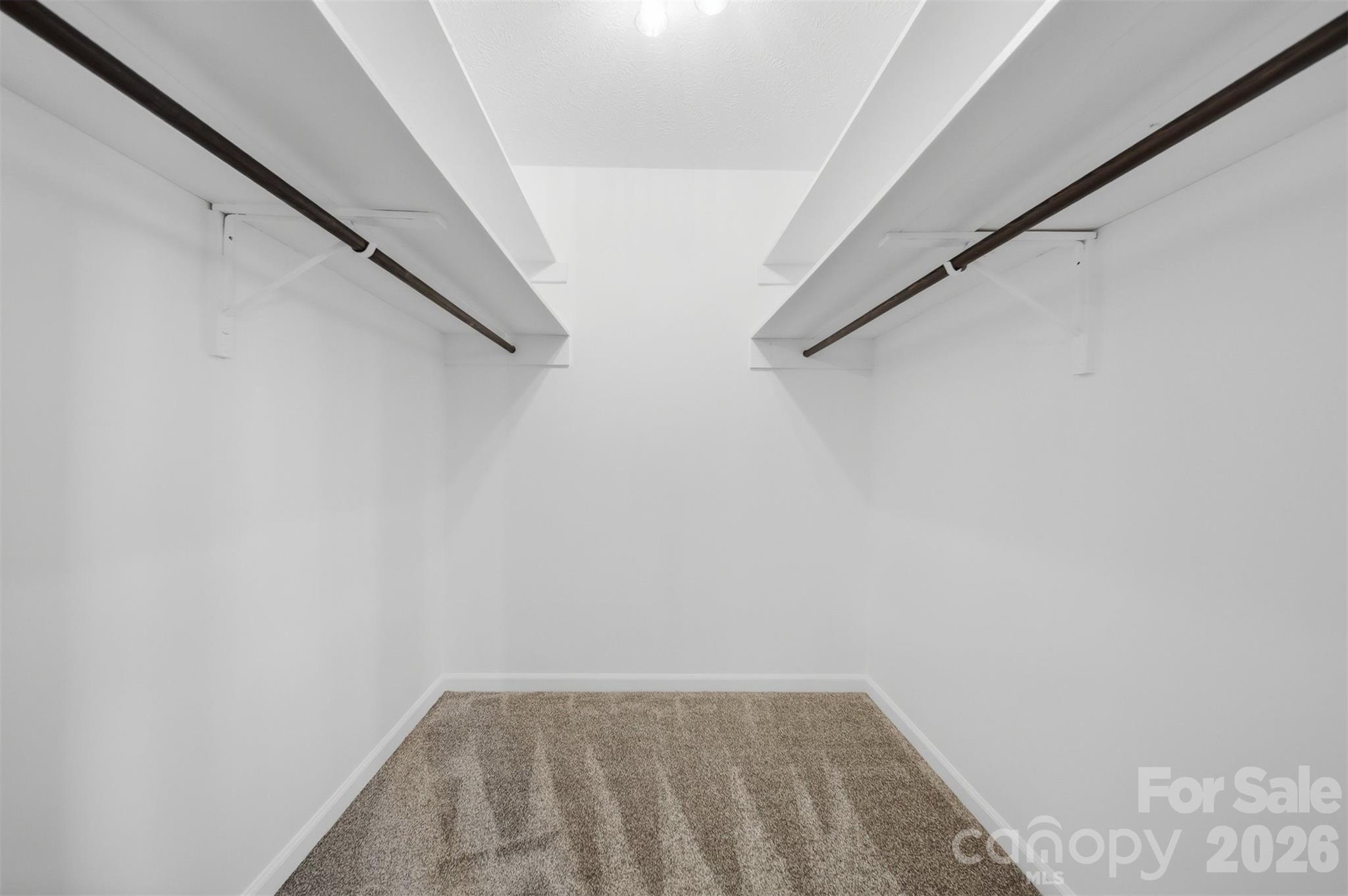 414 7th Street Northeast, Unit 2 Hickory, NC 28601 - Photo 19 of 36 a view of small space with racks on the wall