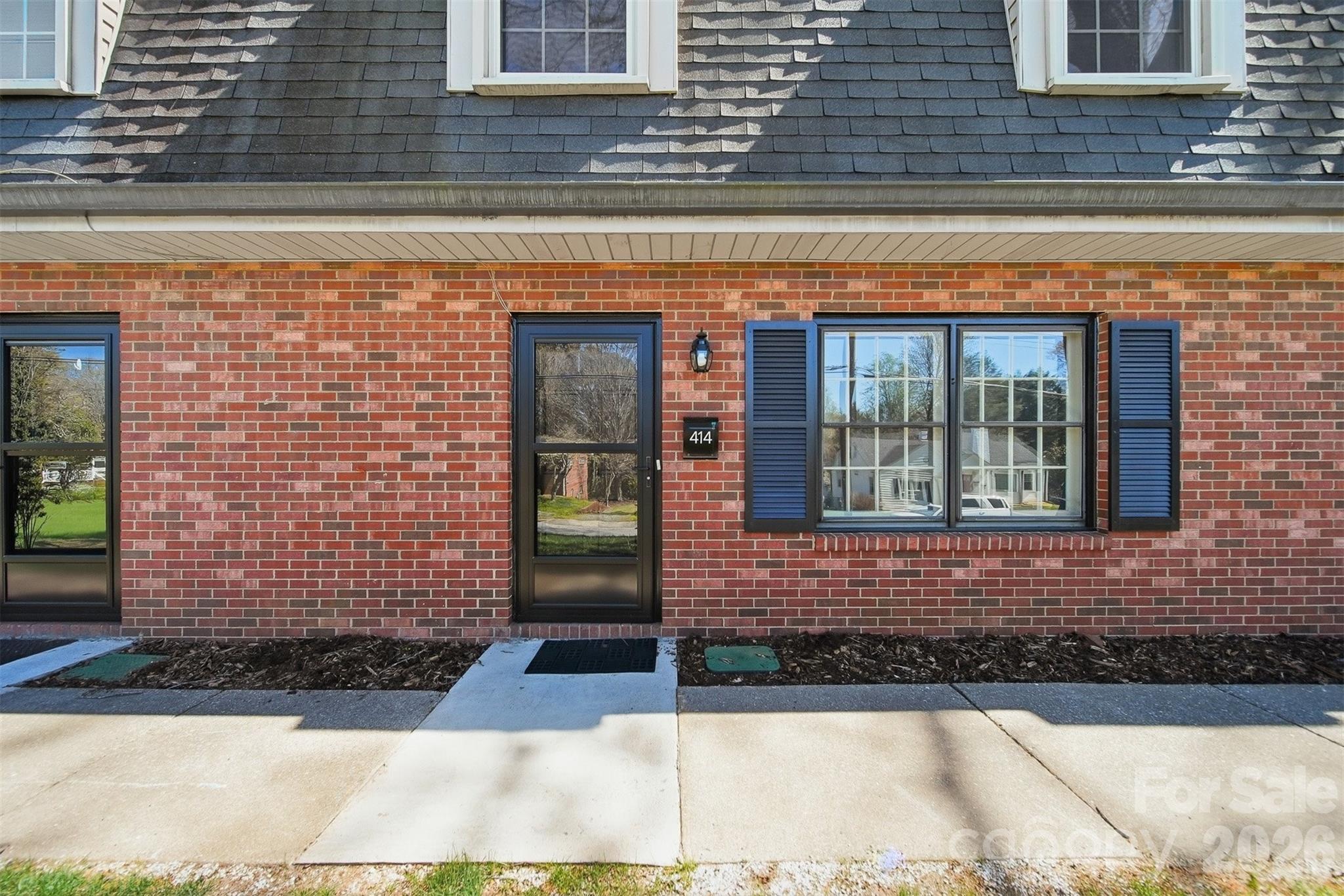 414 7th Street Northeast, Unit 2 Hickory, NC 28601 - Photo 2 of 36 a front view of a house