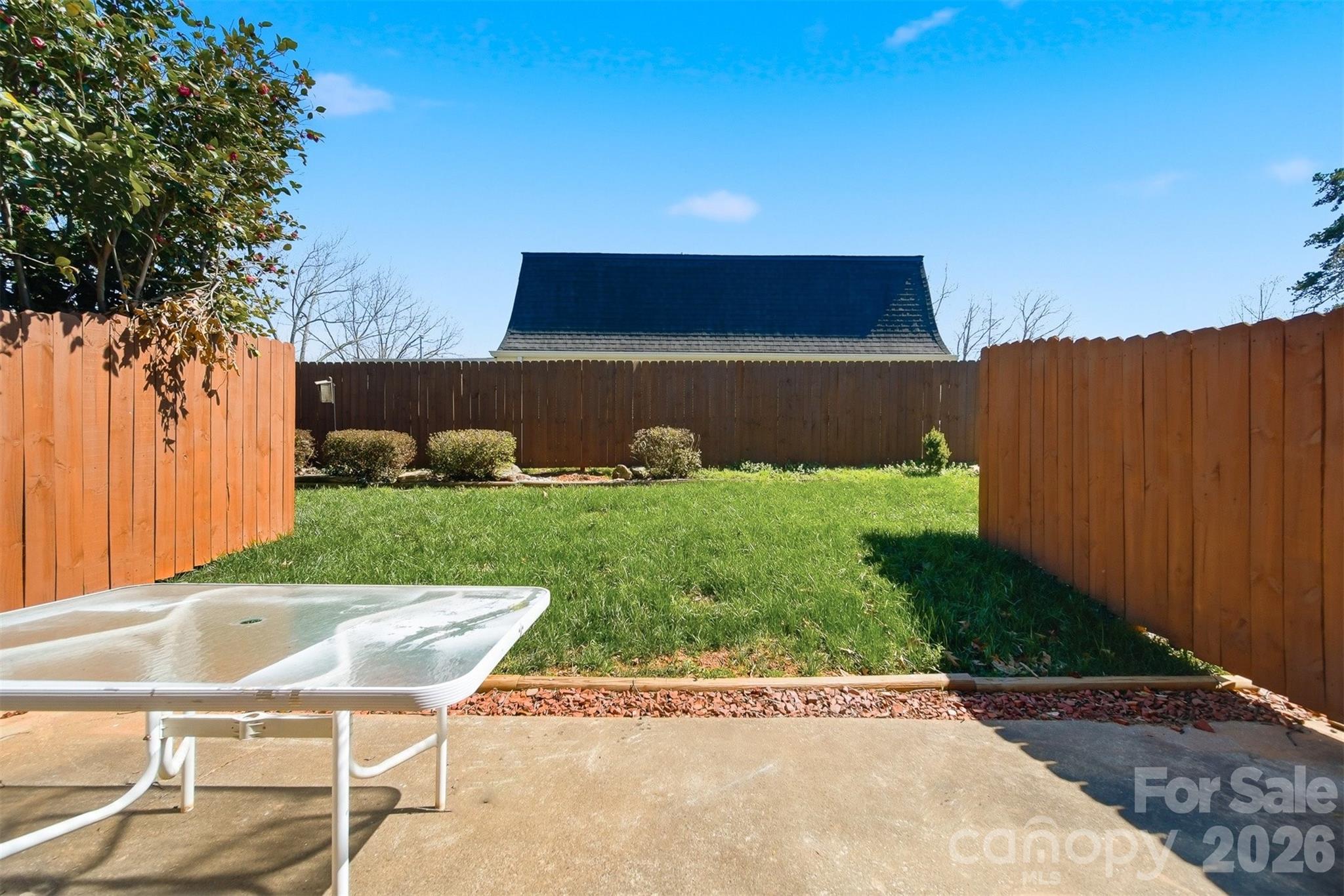 414 7th Street Northeast, Unit 2 Hickory, NC 28601 - Photo 29 of 36 a view of backyard with seating area and green space