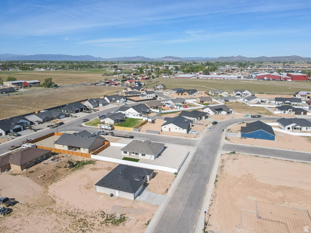 910 East Remington Road Cedar City, UT 84721 - Photo 25 of 29 New construction residential development featuring a mix of single-story homes with dark shingle roofs