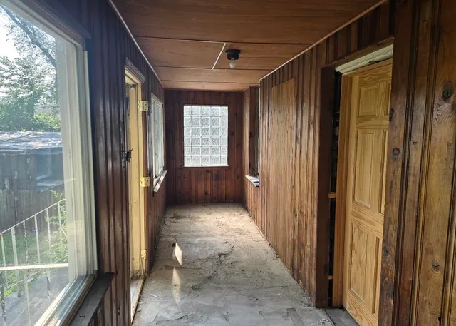 a view of livingroom with furniture and windows
