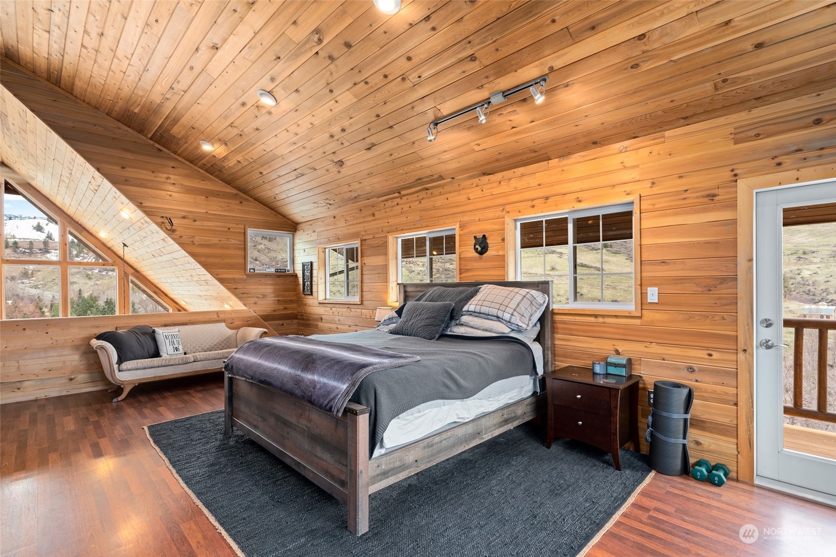 1246 Cranmer Road Wenatchee, WA 98801 - Photo 28 of 39 a bed room with a bed and a couch