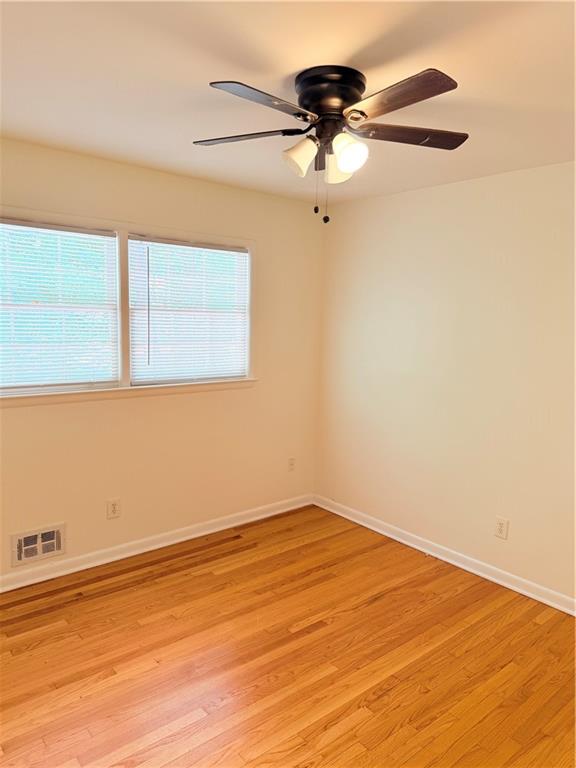 3460 Boring Road Decatur, GA 30034 - Photo 9 of 16 an empty room with a window and a ceiling fan