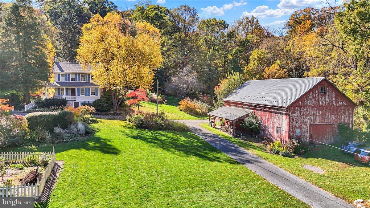Charming countryside retreat with vibrant foliage.