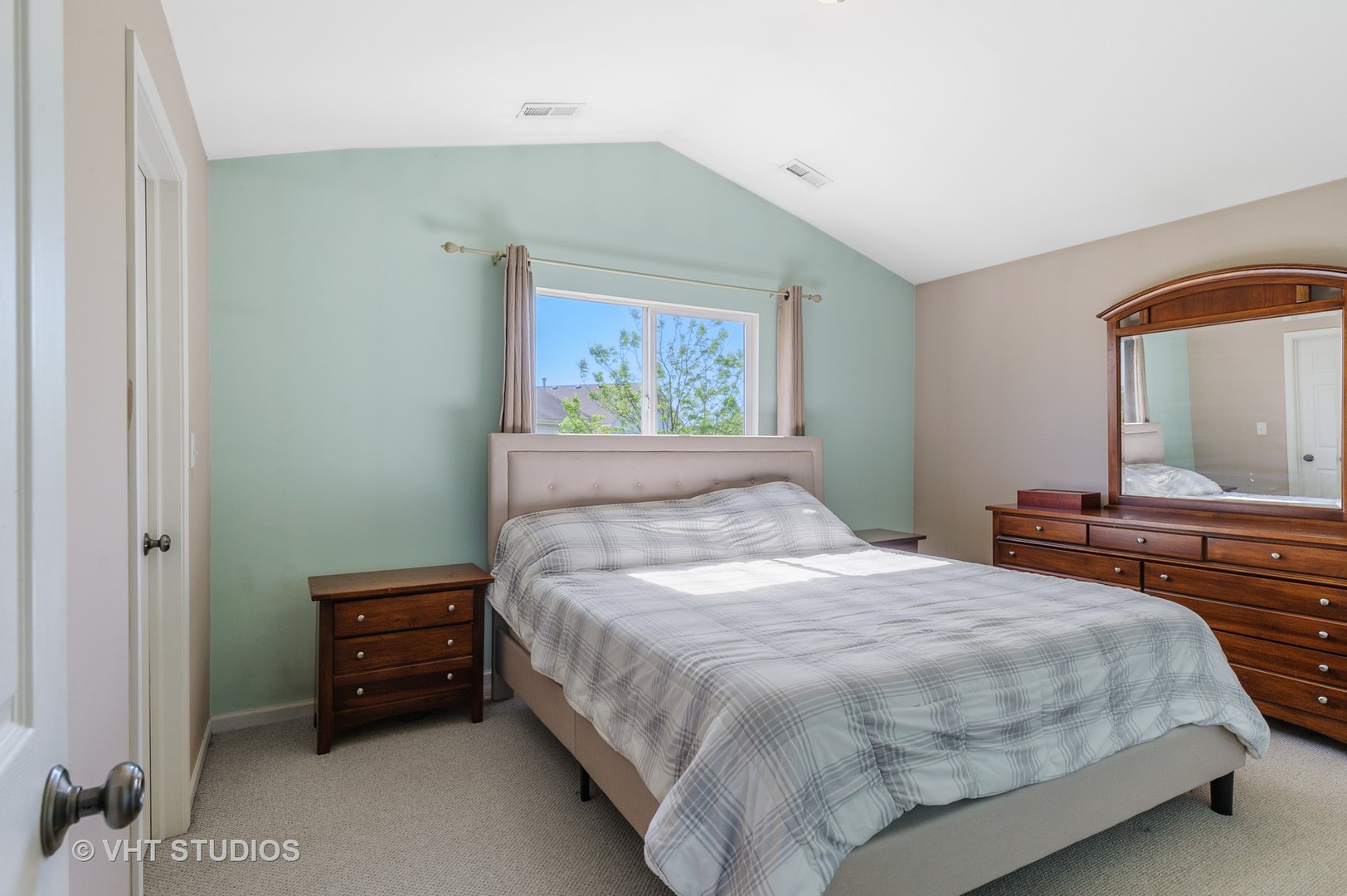 1858 South Fallbrook Drive Round Lake, IL 60073 - Photo 7 of 10 a bedroom with a bed and a dresser