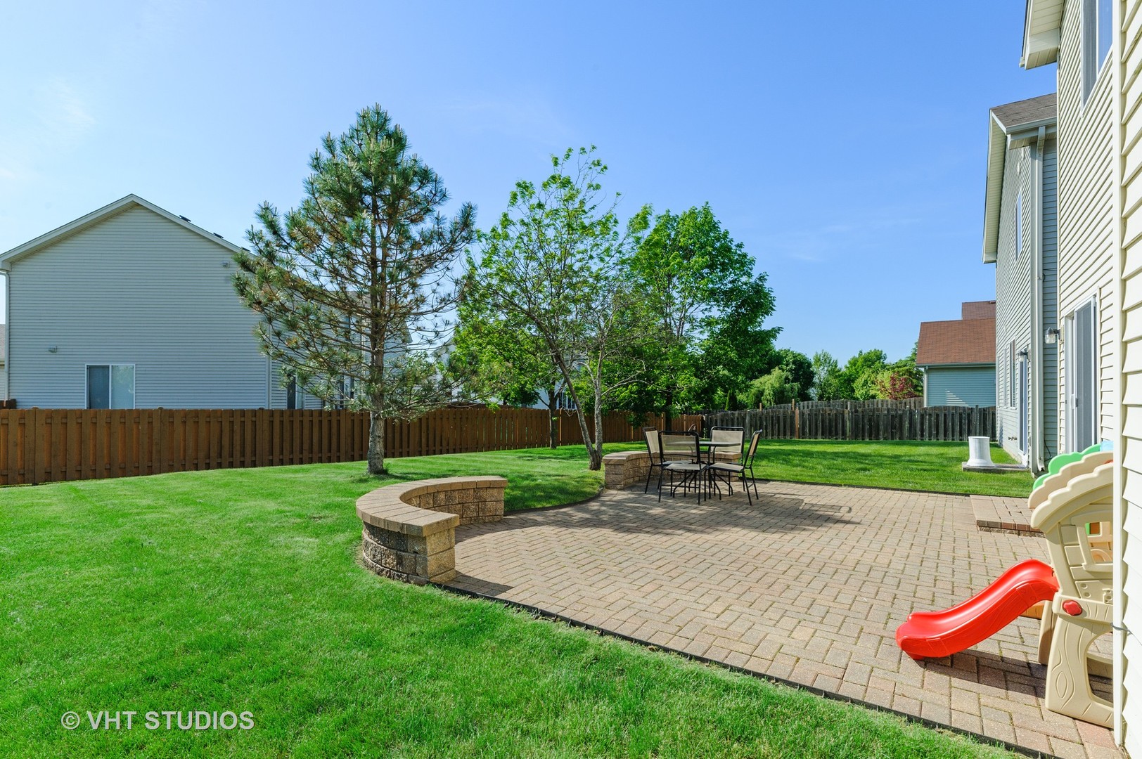 1858 South Fallbrook Drive Round Lake, IL 60073 - Photo 10 of 10 swimming pool with outdoor seating and yard
