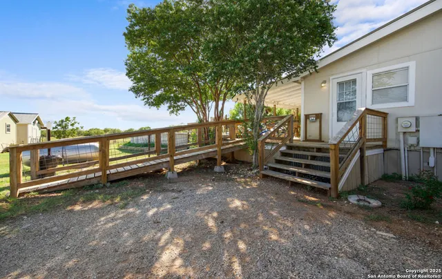 a view of a bench in a backyard