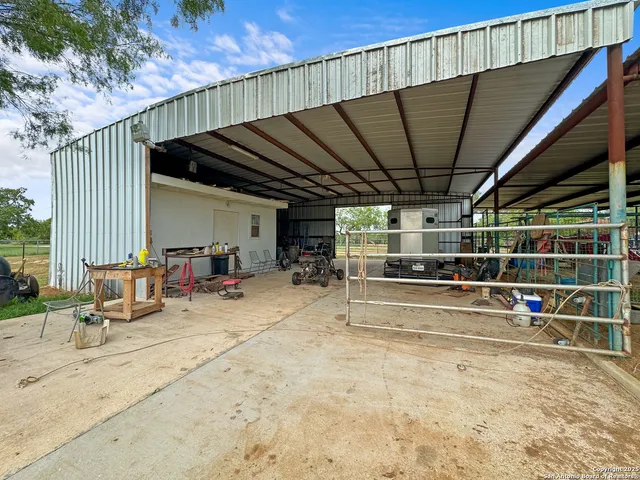 a view of pool with outdoor seating