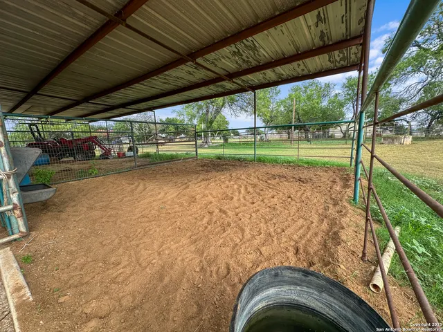 a view of a backyard with a garden