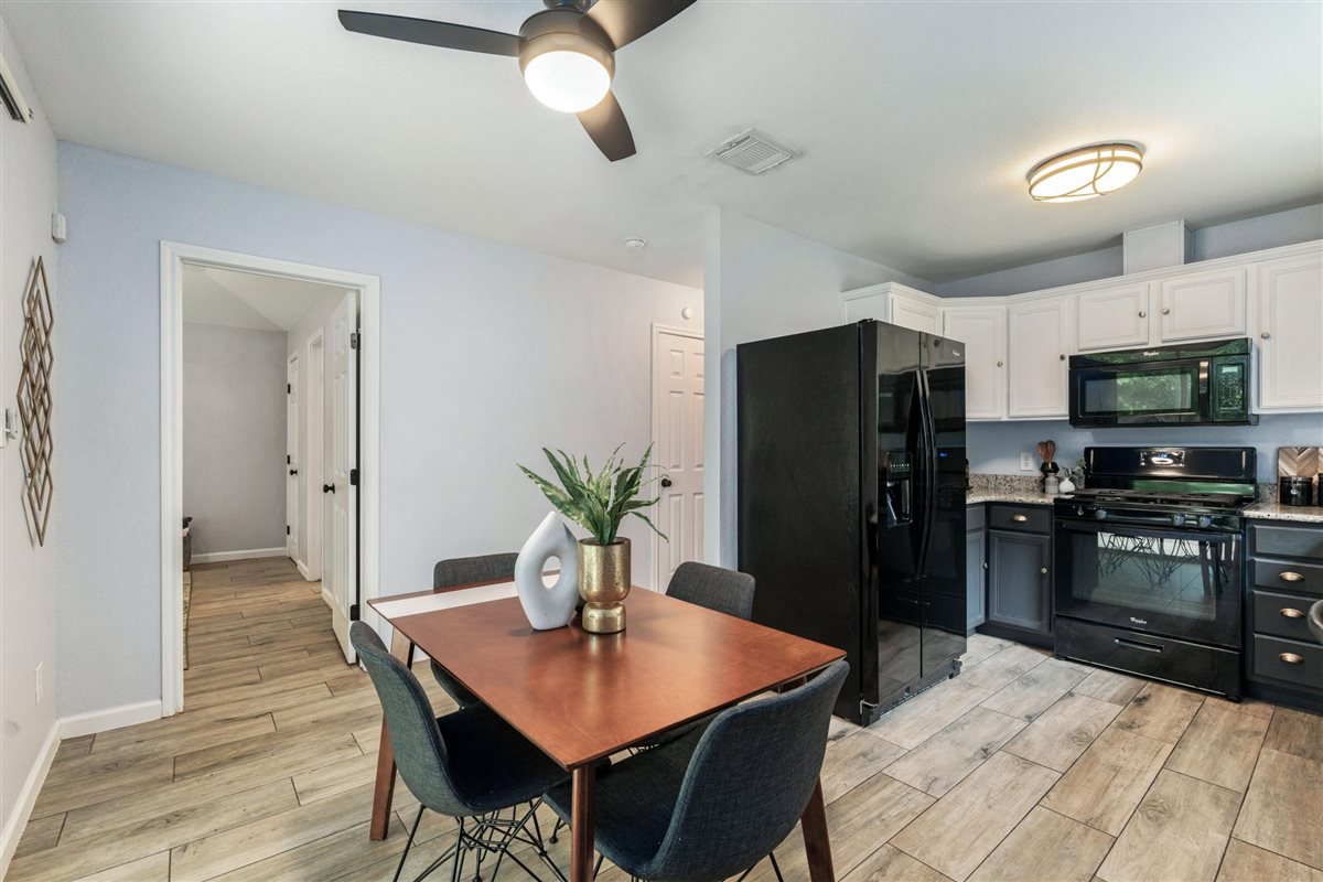 2147 Jasmine Path Round Rock, TX 78664 - Photo 11 of 36 Open sight lines into the kitchen make hosting and meal service effortless.
