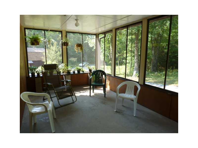 257 Meetinghouse Road Wells, ME 04090 - Photo 12 of 15 Other. Large screened porch with...