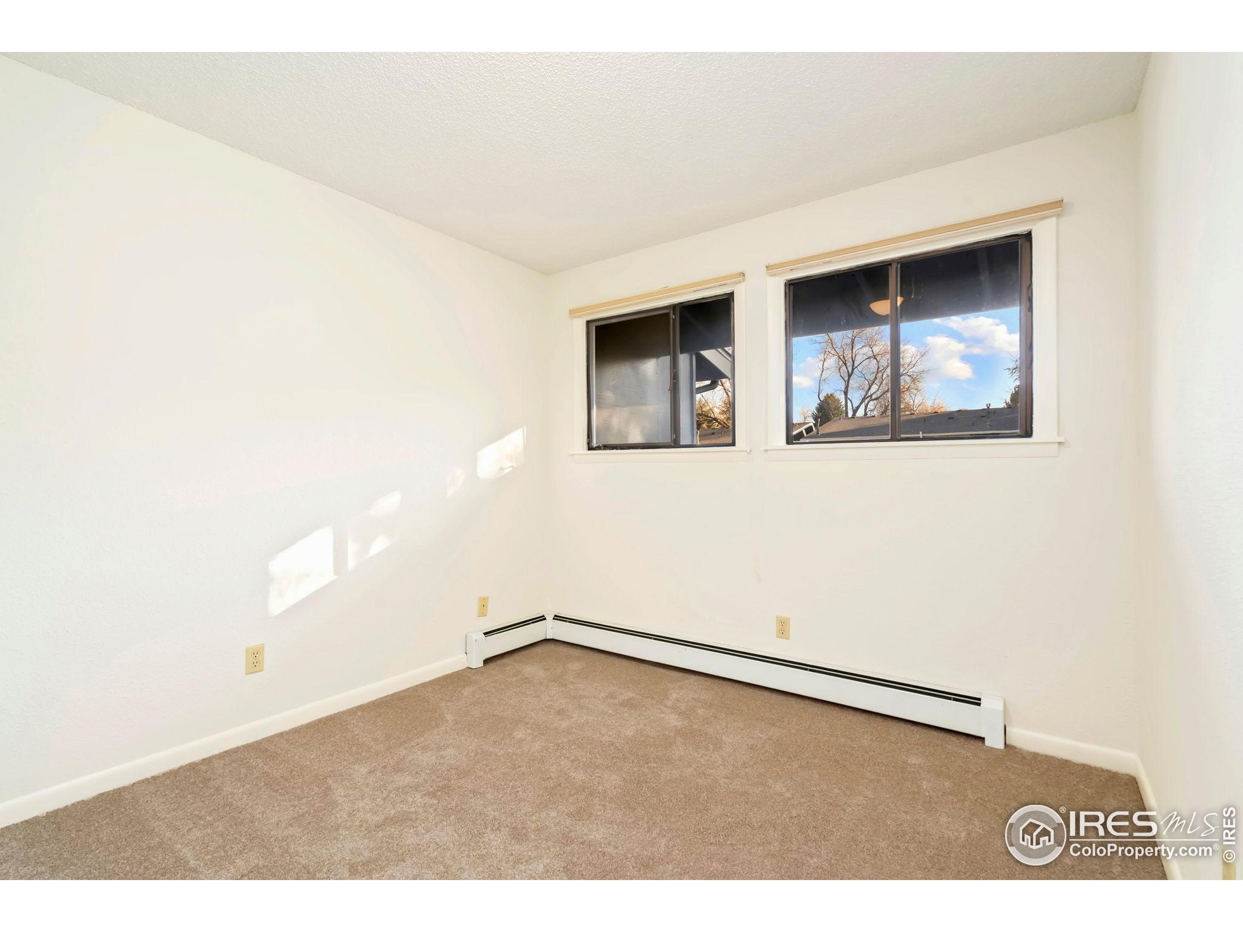 1737 Springmeadows Court, Unit A Fort Collins, CO 80525 - Photo 14 of 20 a view of an empty room