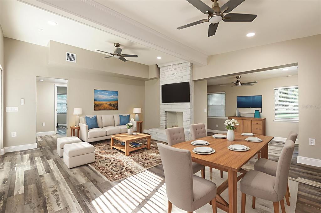 1007 San Domingo Road Orlando, FL 32808 - Photo 7 of 17 a living room with furniture and a flat screen tv