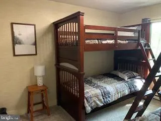 a bathroom with a toilet sink and shower