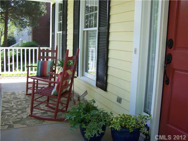 241 Kimberly Road Davidson, NC 28036 - Photo 2 of 16 a view of a bench in the porch