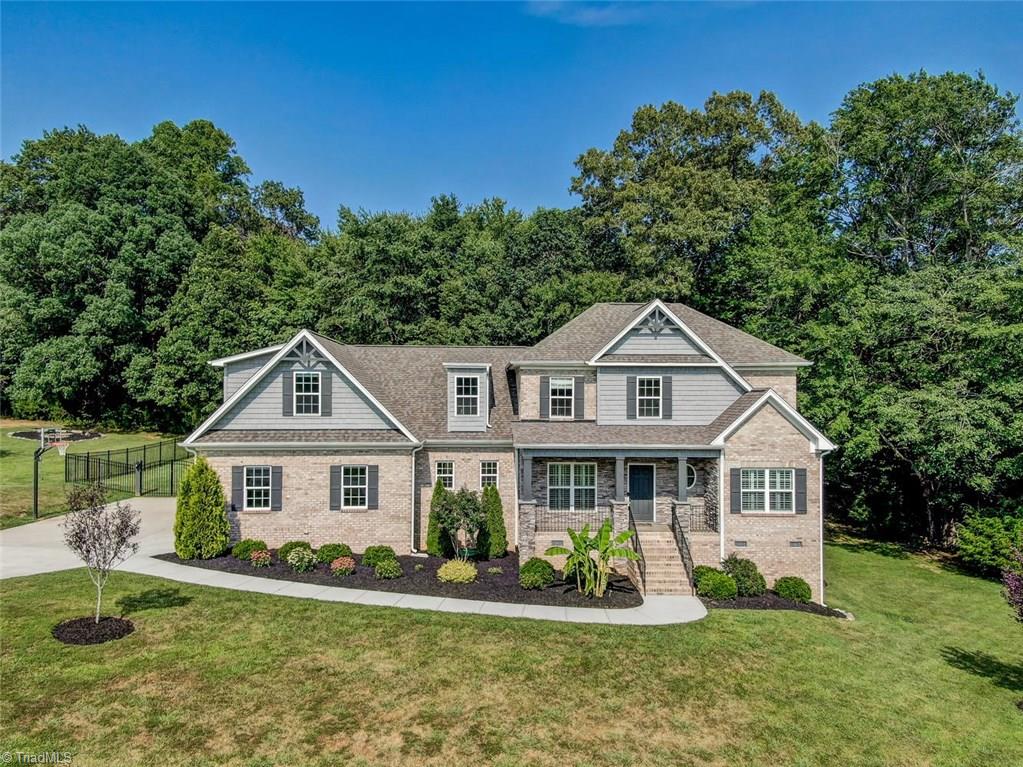 Beautiful home in Scott's Grant has so much to offer beginning with the rocking chair front porch! 