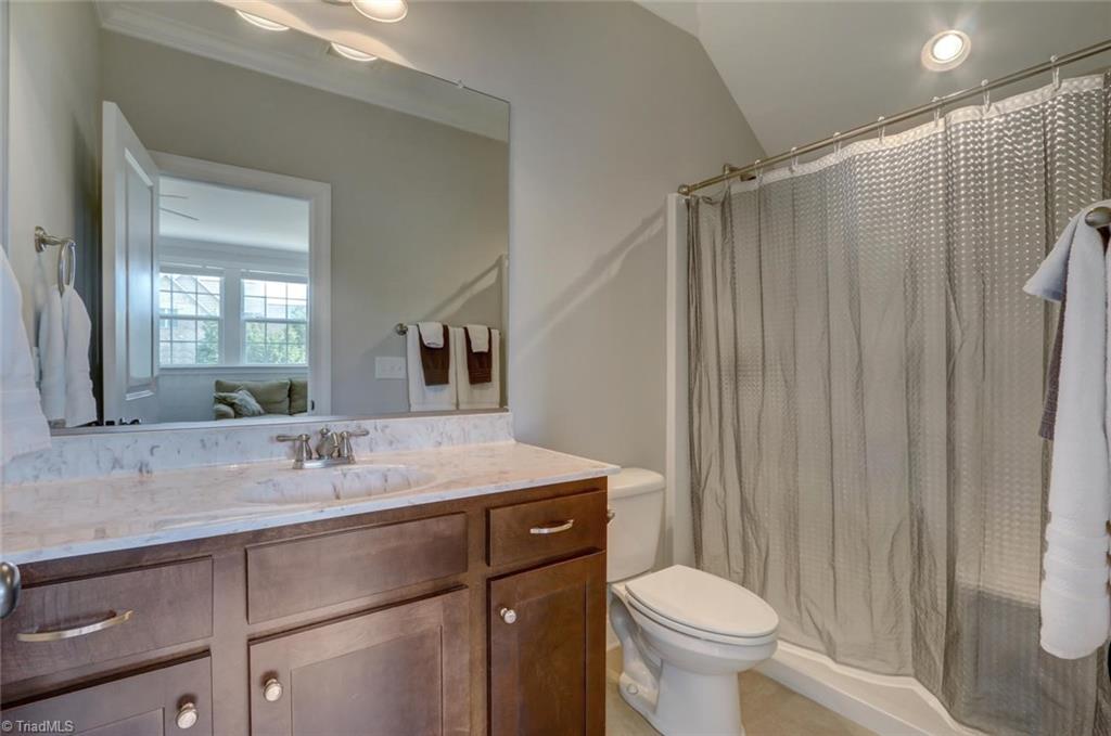 7772 Sutter Road Greensboro, NC 27455 - Photo 24 of 30 Full bath in the bonus makes this space perfect to use as a guest suite if needed!