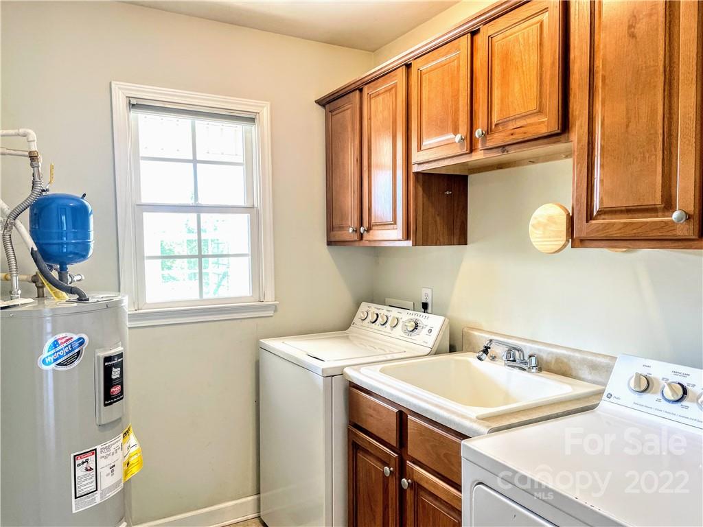 181 Hunters Trace Rutherfordton, NC 28139 - Photo 9 of 15 a bathroom with a sink a vanity and a window