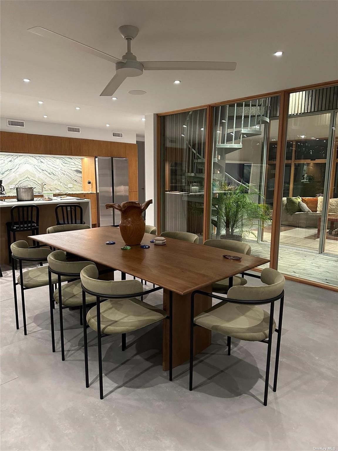 25 Sloop Walk Ocean Beach, NY 11770 - Photo 3 of 11 a view of a dining room with furniture window and outside view