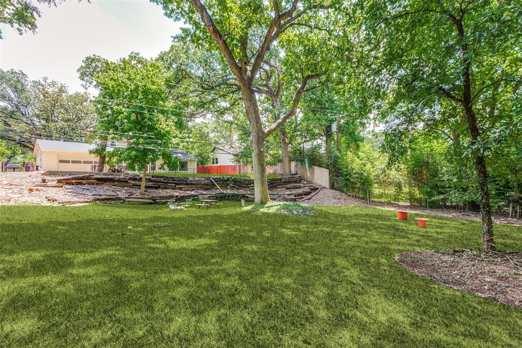 4316 Springbranch Drive Benbrook, TX 76116 - Photo 36 of 39 Expansive grassy yard with mature trees