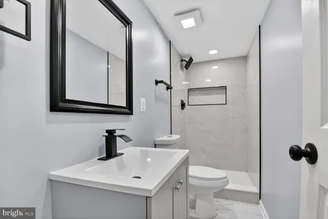 a view of a patio with a table and chairs