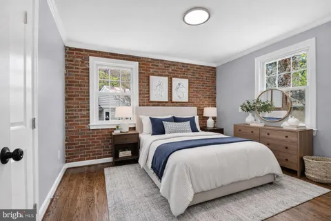 a large kitchen with stainless steel appliances granite countertop a stove sink and cabinets