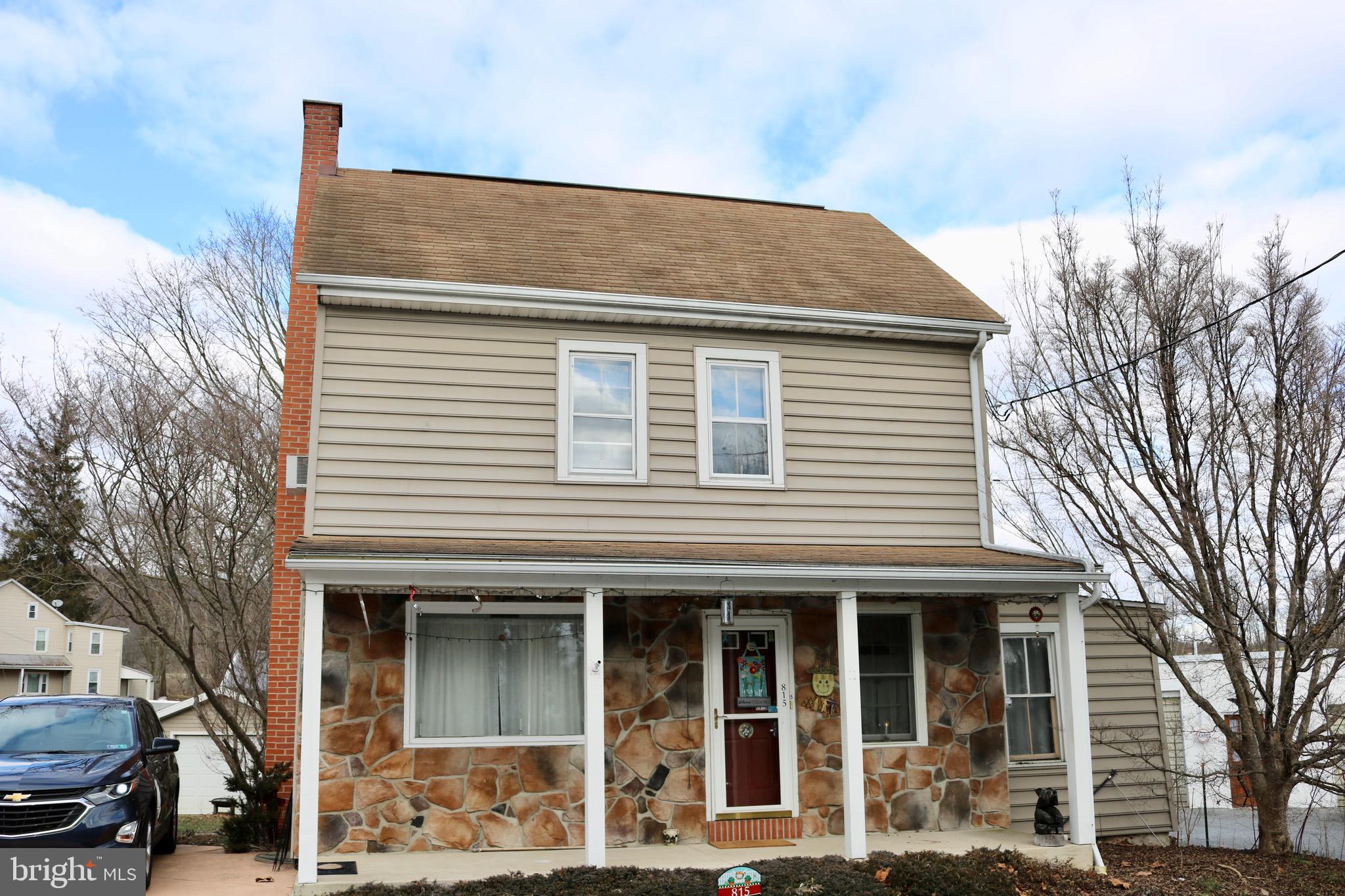 815 Haldeman Street Hopeland, PA 17543 - Photo 1 of 16 Newer beaded siding, chimney, fr. porch & driveway