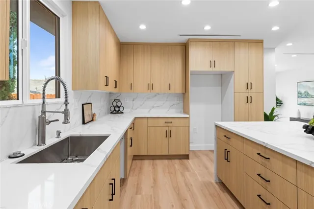 a living room with furniture a large window with outer view