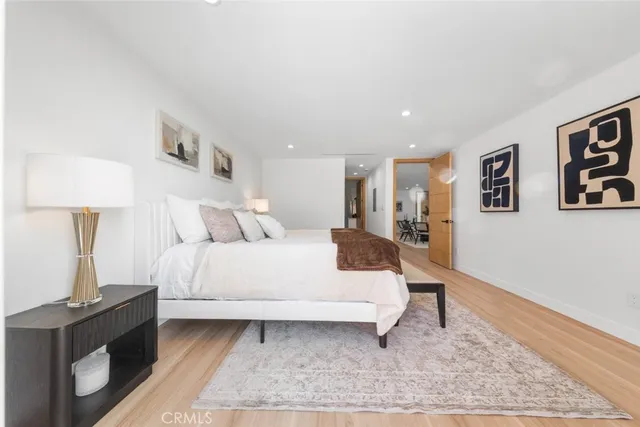 a bathroom with a granite countertop sink a shower and a mirror