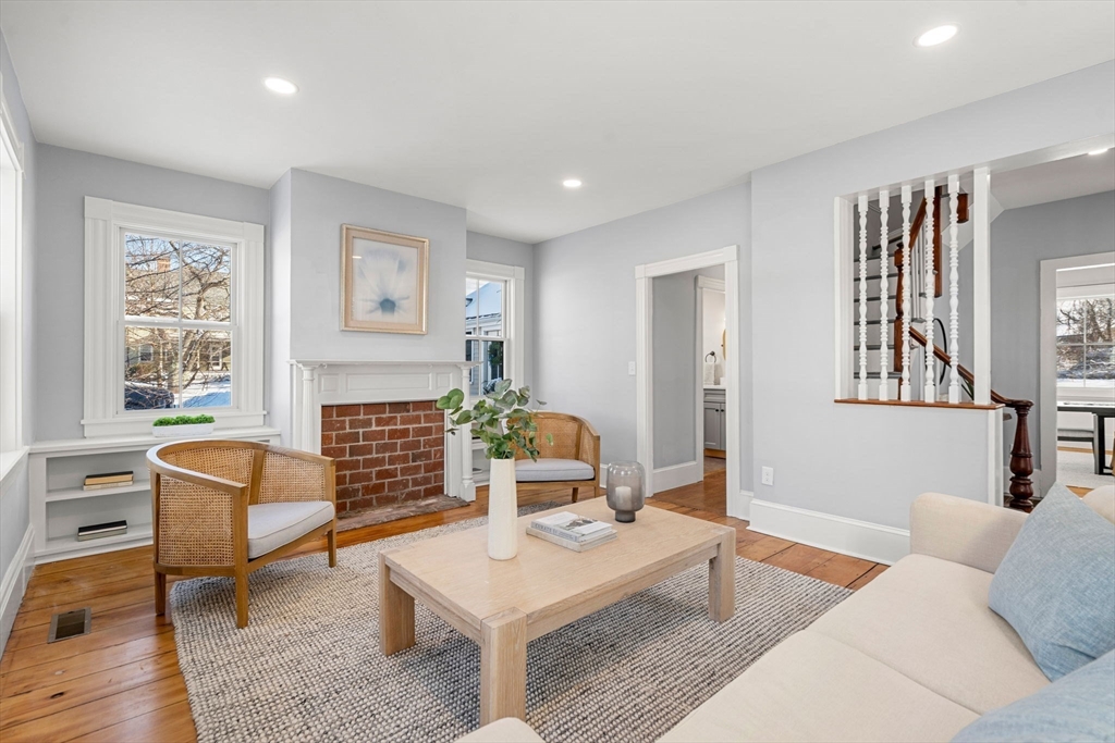 201 Main Street Rowley, MA 01969 - Photo 15 of 42 a living room with furniture and a fireplace