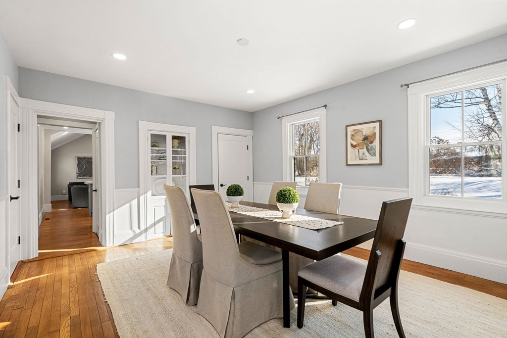 201 Main Street Rowley, MA 01969 - Photo 18 of 42 a view of a dining room with furniture window and wooden floor