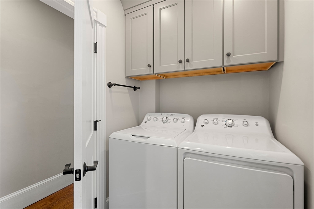 201 Main Street Rowley, MA 01969 - Photo 20 of 42 a utility room with dryer and washer