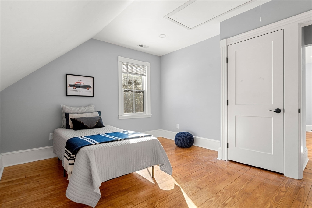 201 Main Street Rowley, MA 01969 - Photo 28 of 42 a bedroom with a bed and a window