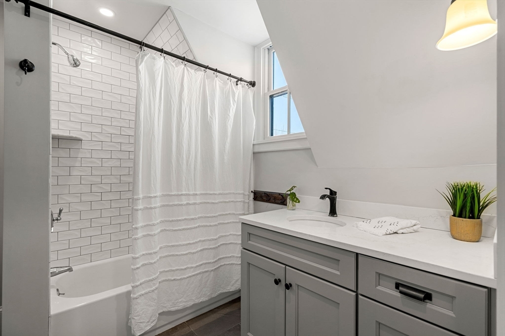 201 Main Street Rowley, MA 01969 - Photo 29 of 42 a bathroom with a sink and a mirror