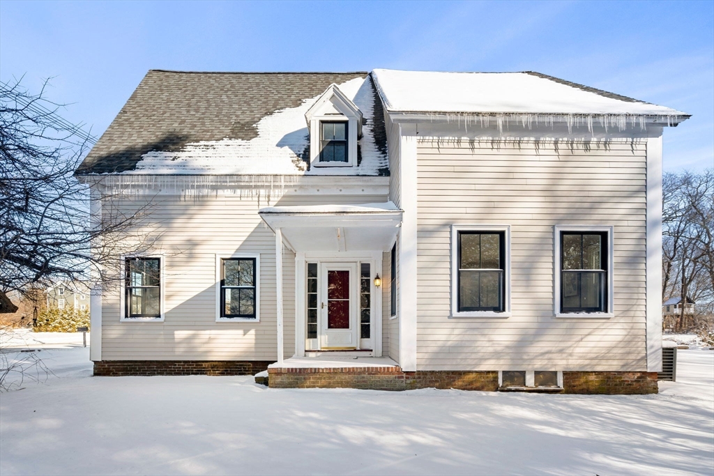201 Main Street Rowley, MA 01969 - Photo 4 of 42 a front view of a house