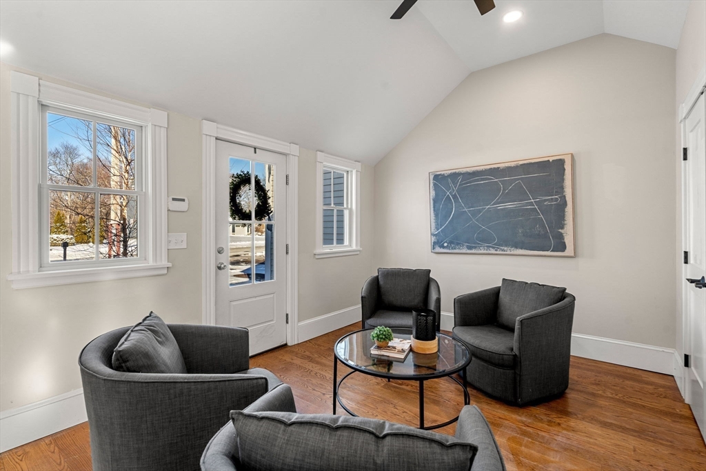 201 Main Street Rowley, MA 01969 - Photo 6 of 42 a living room with furniture and a wooden floor