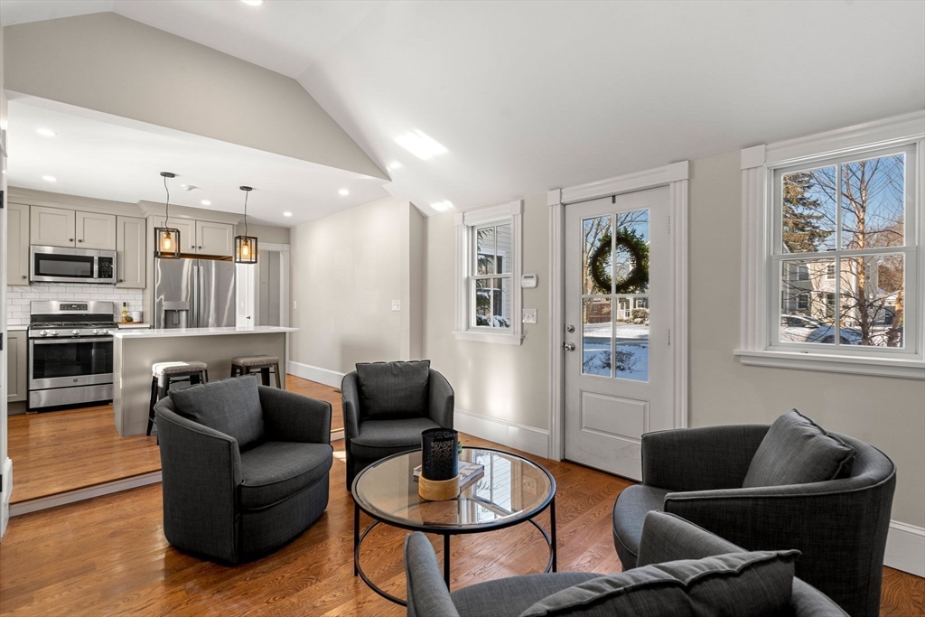 201 Main Street Rowley, MA 01969 - Photo 7 of 42 a living room with furniture kitchen and a window