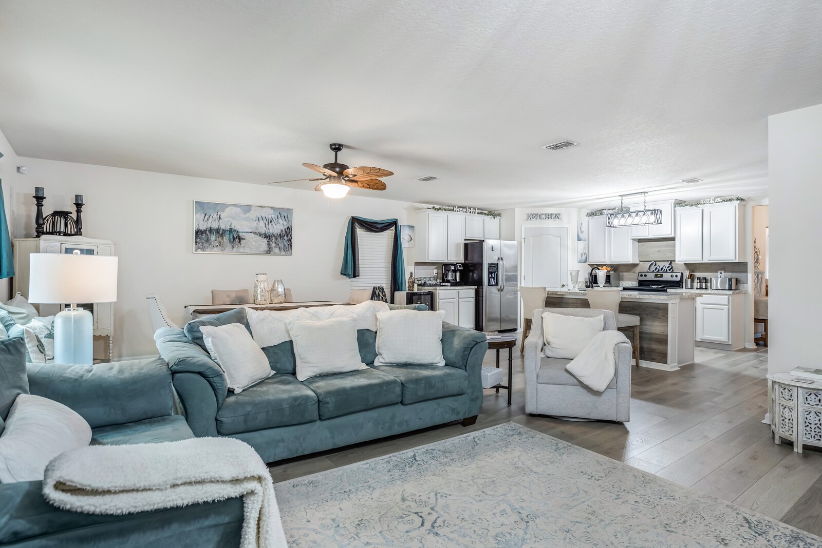95170 Timberlake Drive Fernandina Beach, FL 32034 - Photo 3 of 36 a living room with furniture and kitchen view