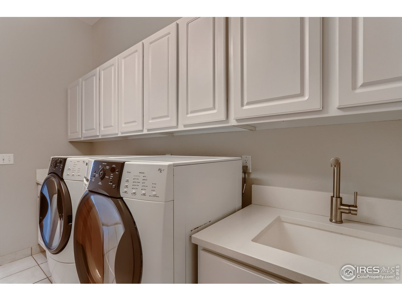 814 Mountain View Drive Lyons, CO 80540 - Photo 19 of 36 a utility room with dryer and washer
