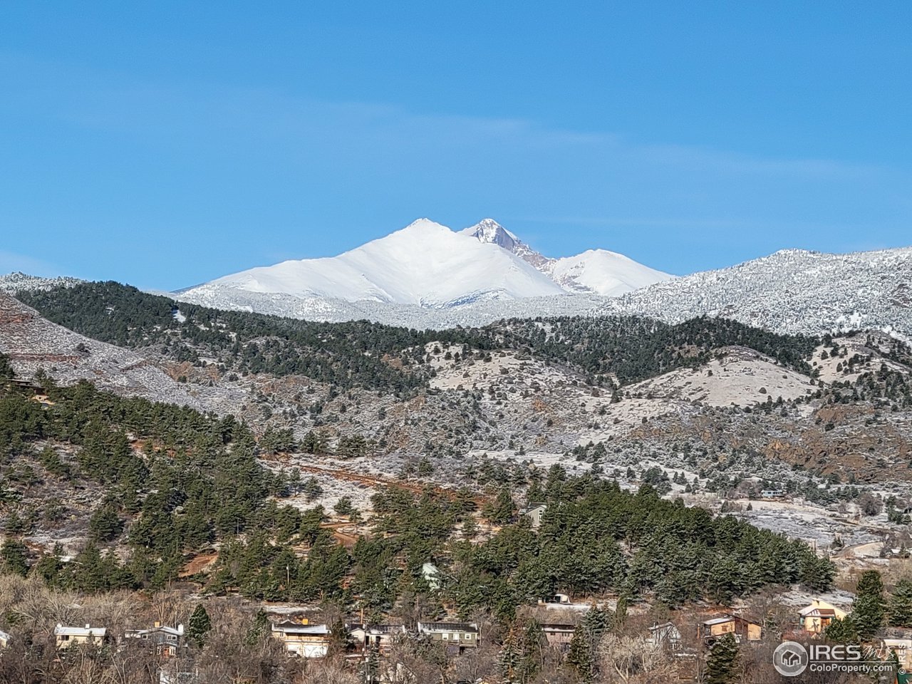 814 Mountain View Drive Lyons, CO 80540 - Photo 34 of 36 a view of a house with a mountain in the background