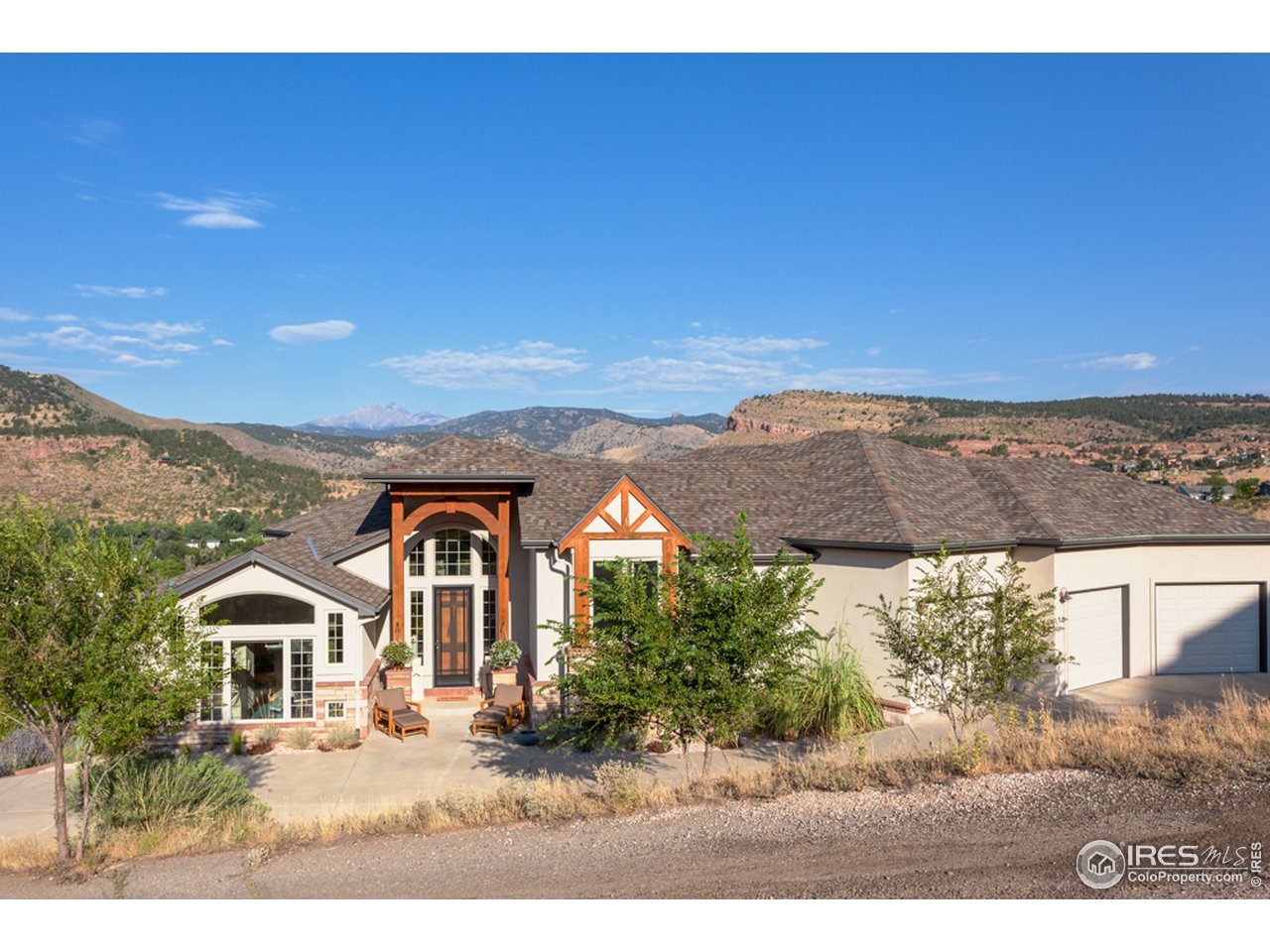 814 Mountain View Drive Lyons, CO 80540 - Photo 5 of 36 a front view of a house with a yard