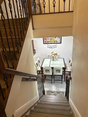 a view of livingroom with furniture and workspace