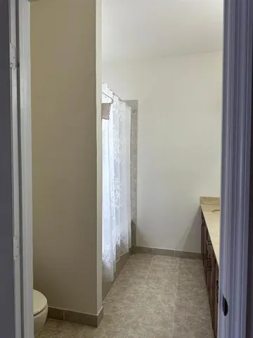 a view of a bathroom with a sink and a toilet