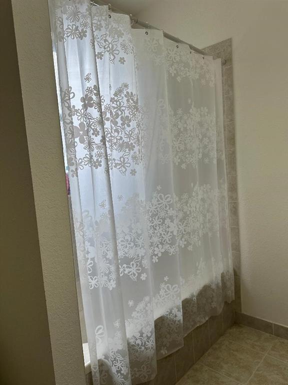 8824 Southwest 153rd Court Miami, FL 33196 - Photo 23 of 25 a bathroom with a shower